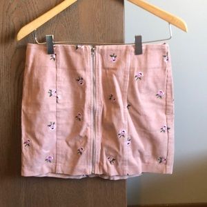 Pink front zipper mini skirt